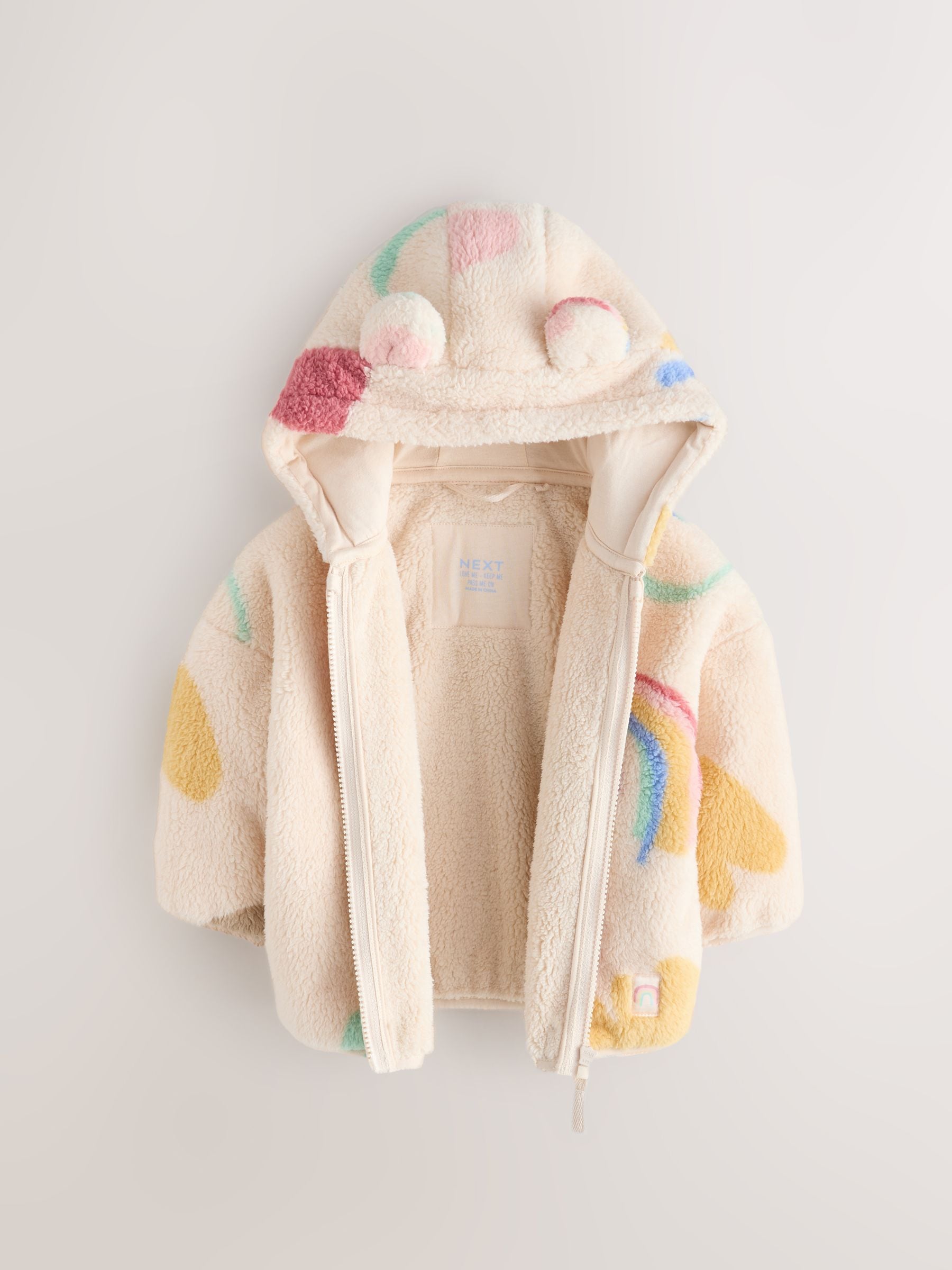 Crème tekeningetjes print - Fleece met ritssluiting (3mnd-7jr)