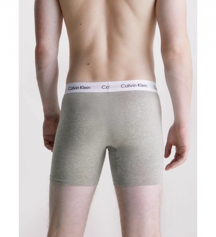 Conjunto de 3 cuecas boxer longas Calvin Klein nas cores cinza, branca e preta.