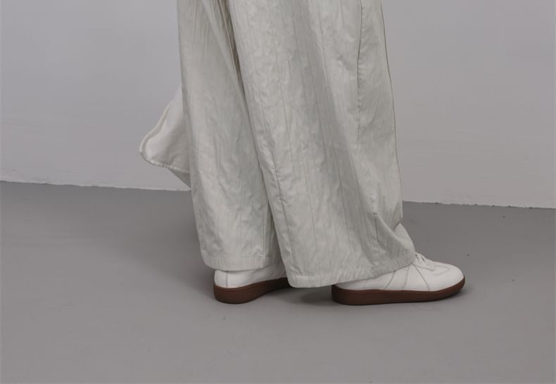 SIMPLE BLACK - Effen broek met elastische taille en wijde pijpen