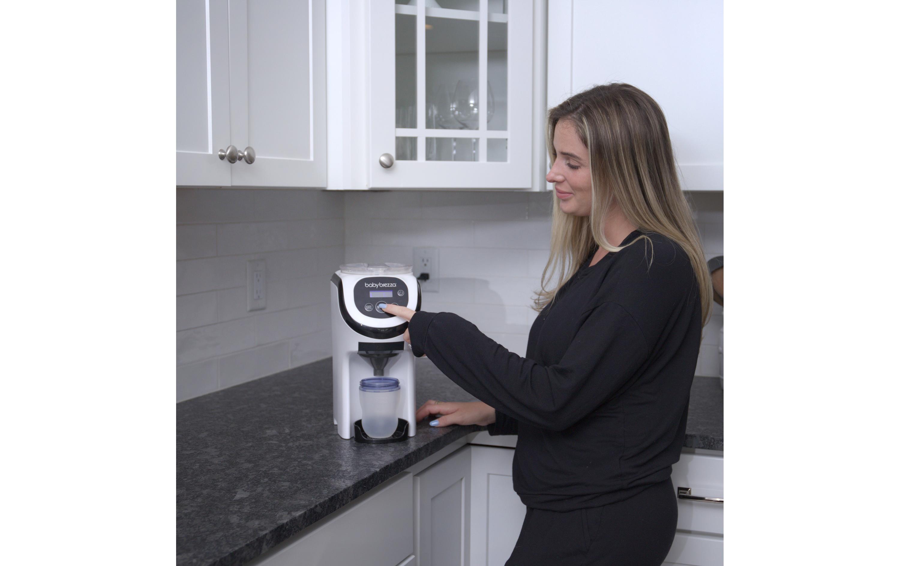 Flaschenwärmer Formula Pro Mini Weiss<br>Automatischer Flaschenzubereiter: dosiert, mischt und erwärmt Milchpulver auf Knopfdruck