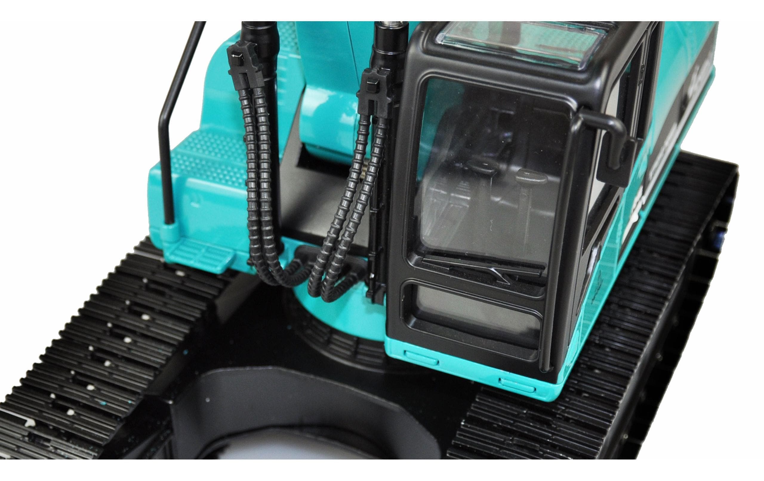 Kettenbagger G704E Vollmetall Petrol, 1:14, RTR<br>Exklusiver Vollmetall Bagger in einer Sonderlackierung und elektronischen Schnellwechsler