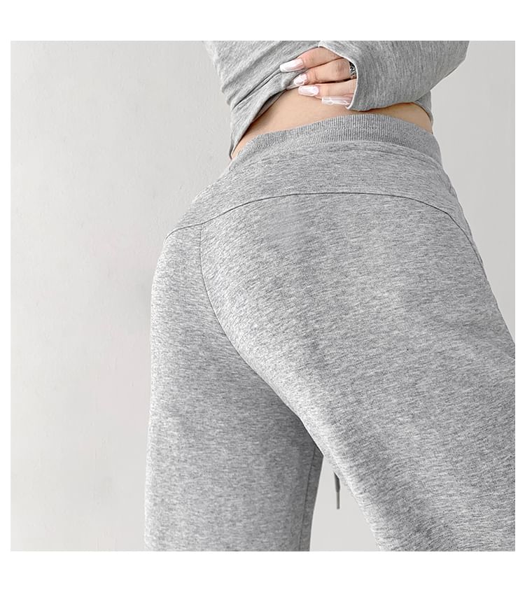 Shira - Lage, uitlopende joggingbroek met trekkoord