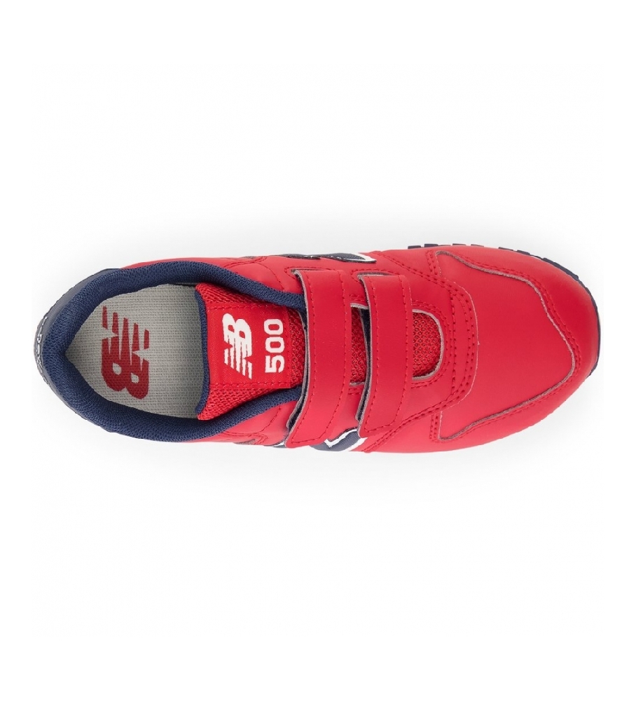 Tênis New Balance 500 com fecho de velcro, cor vermelha.