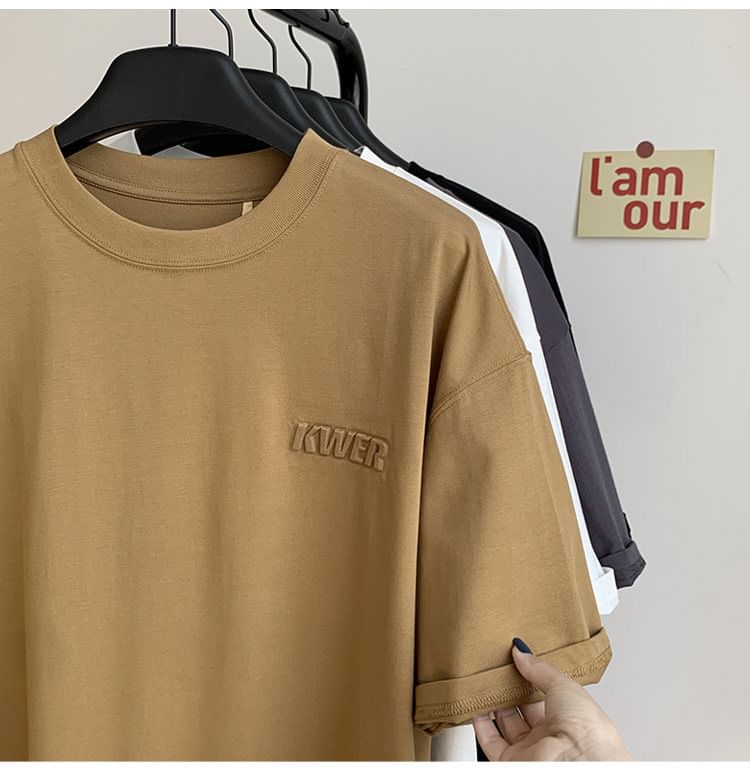 FOEV - T-shirt met ronde hals en elleboogmouwen en belettering