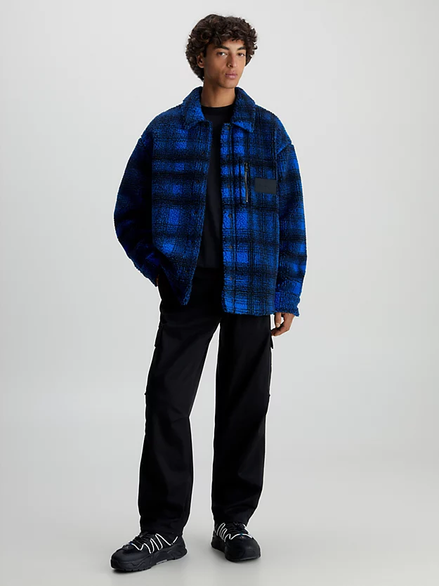 Jaqueta camisa xadrez sherpa