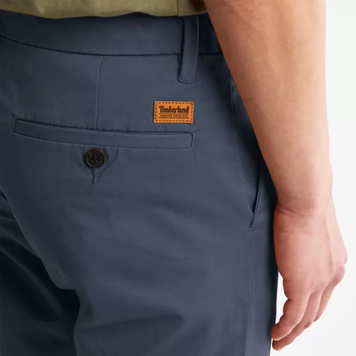 Calças chino elásticas Sargent Lake para homem, na cor azul.