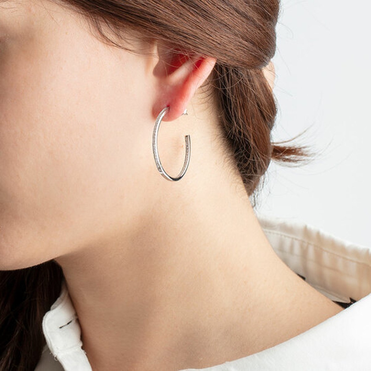 Boucles d'oreilles créoles Lotus Silver oxydes