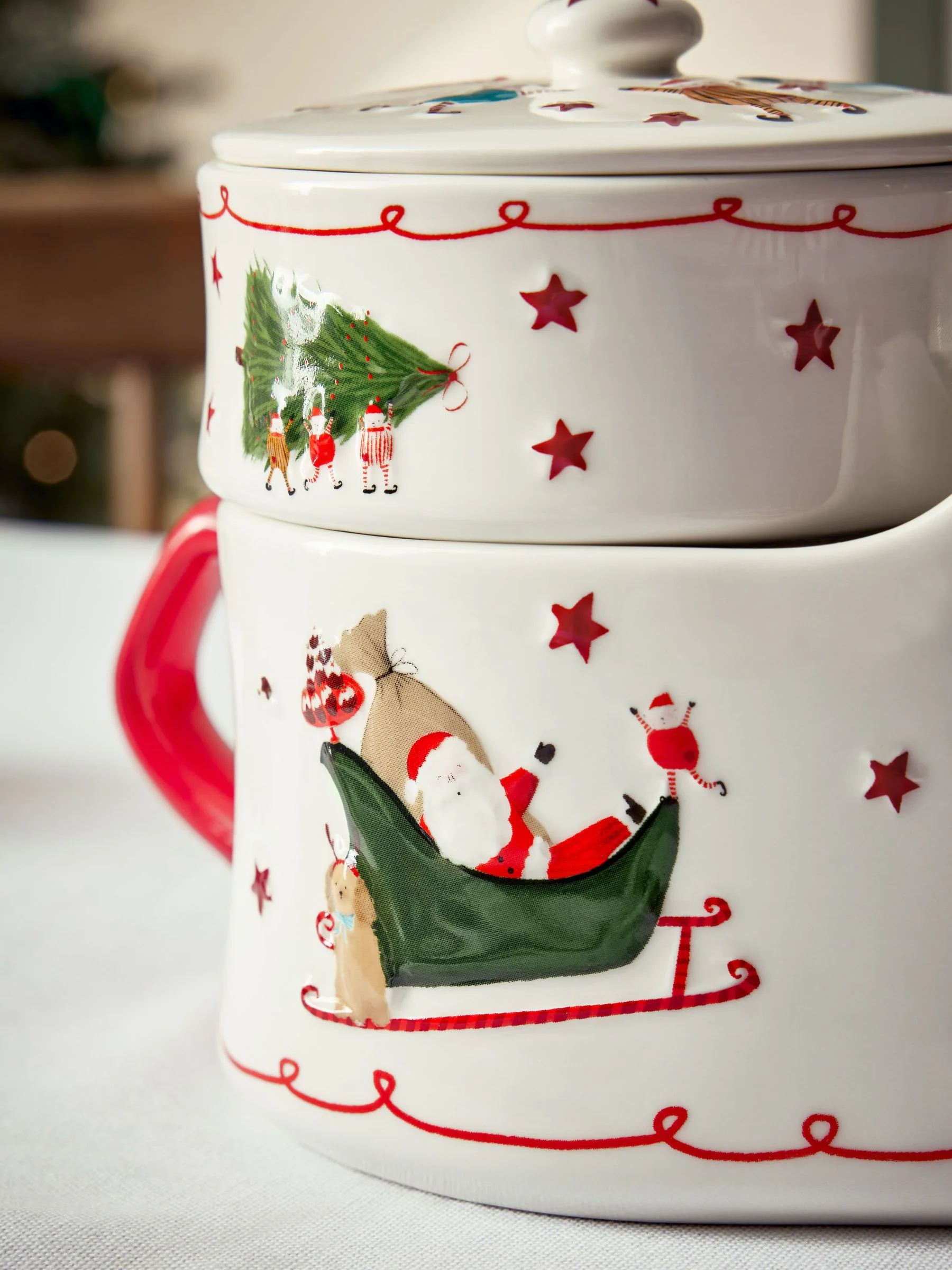 Santa stapelbare juskom en condimentenpot