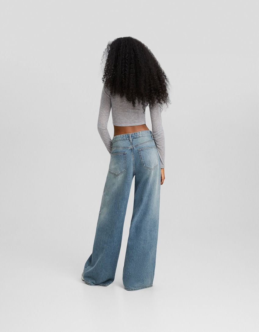 calça jeans de perna larga