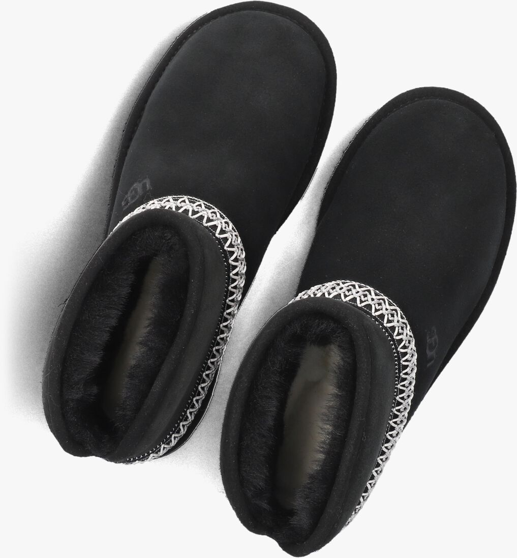zwarte ugg vachtlaarzen classic mini crescent