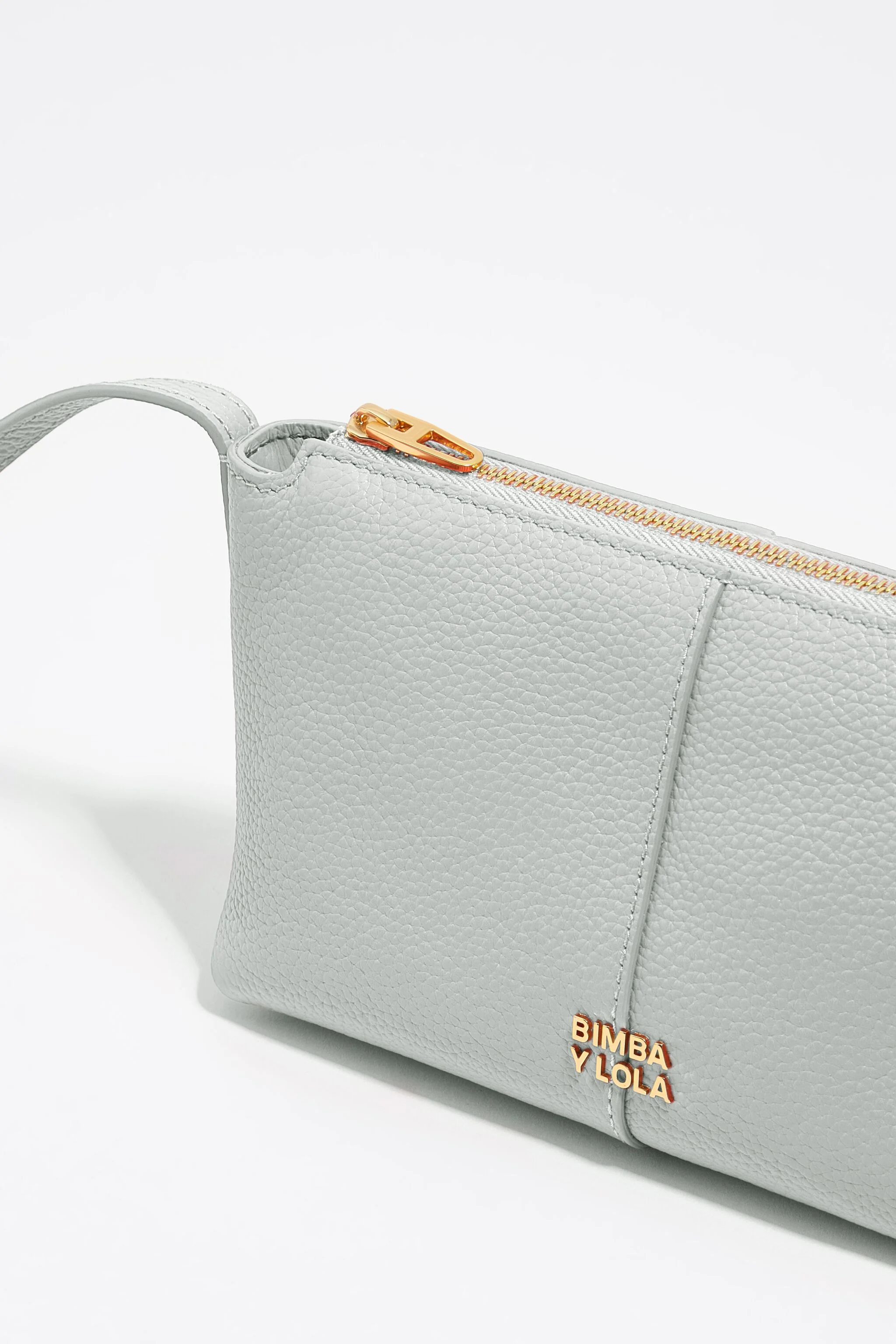 Bolsa transversal mini em couro branco pedra
