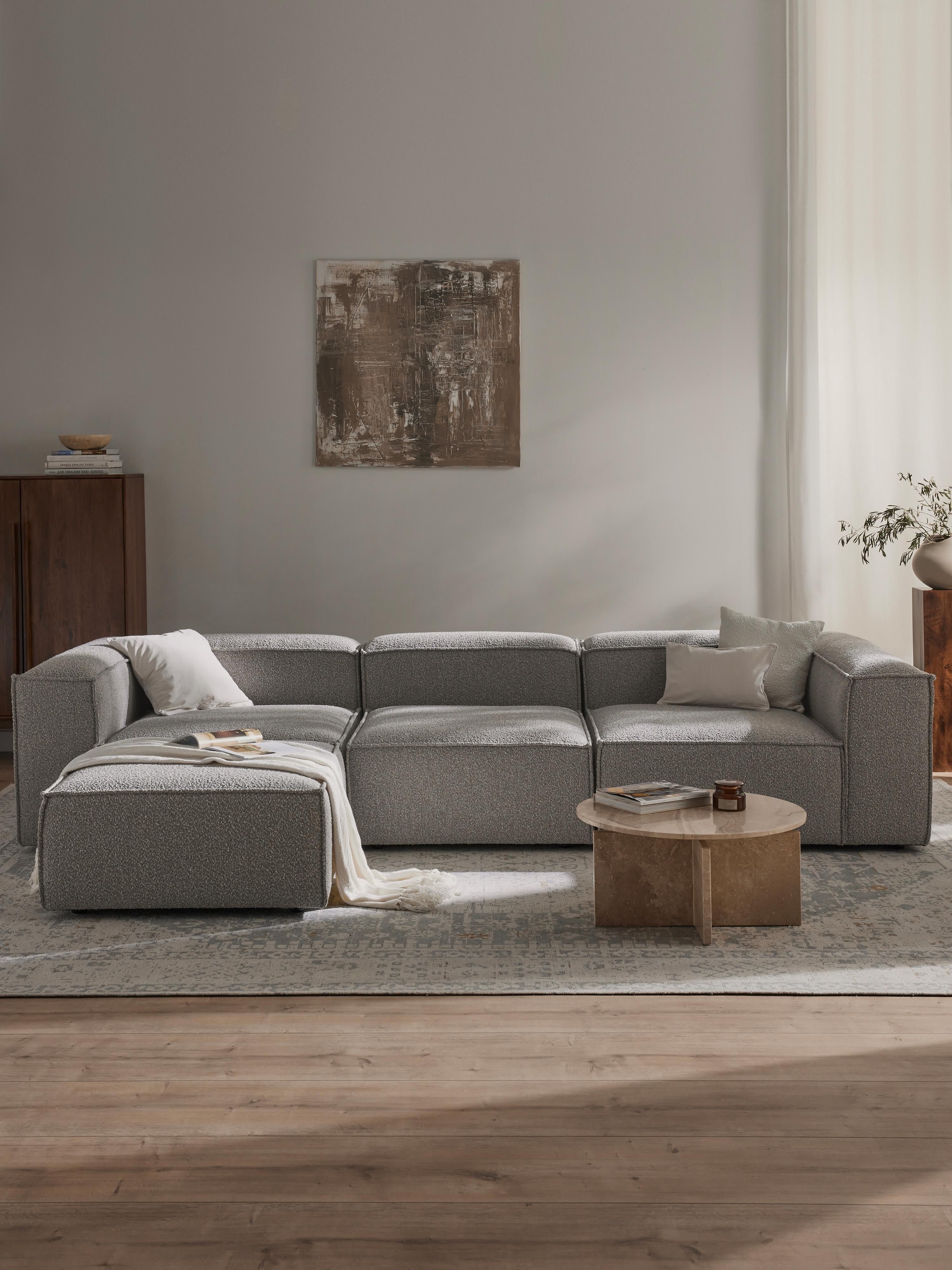 Lennon 4-zits modulaire bank in bouclé met poef (links/rechts)