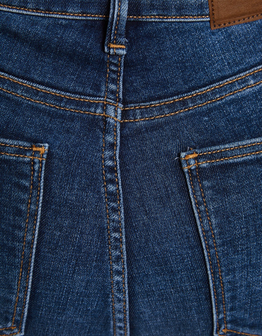 calça jeans skinny de cintura super alta