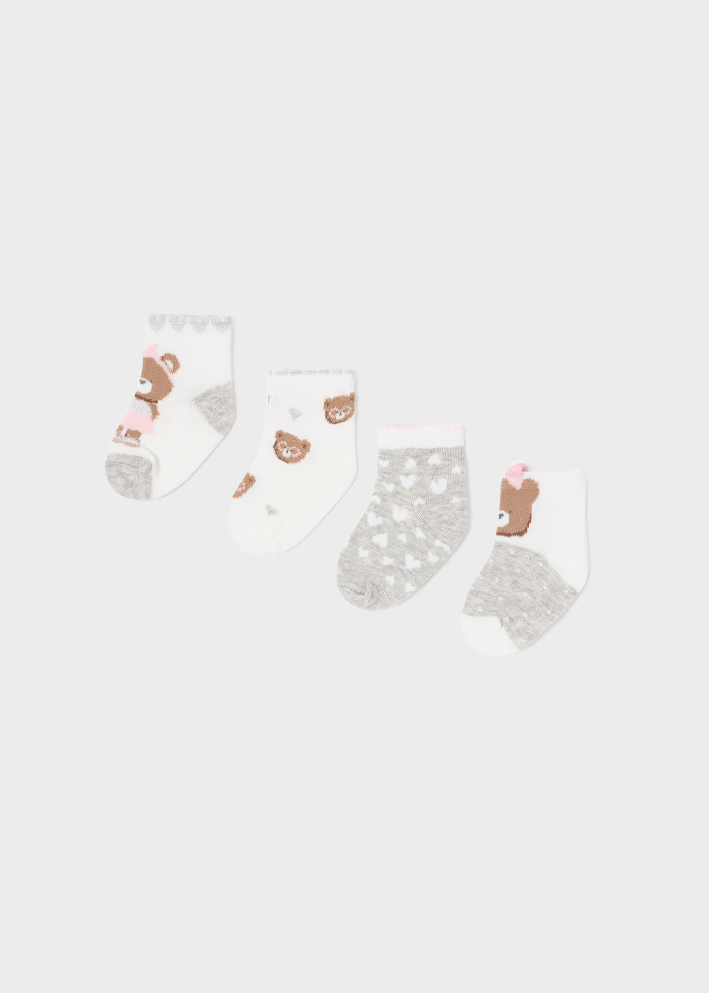 Pacote com 4 pares de meias de algodão orgânico para recém-nascidos.