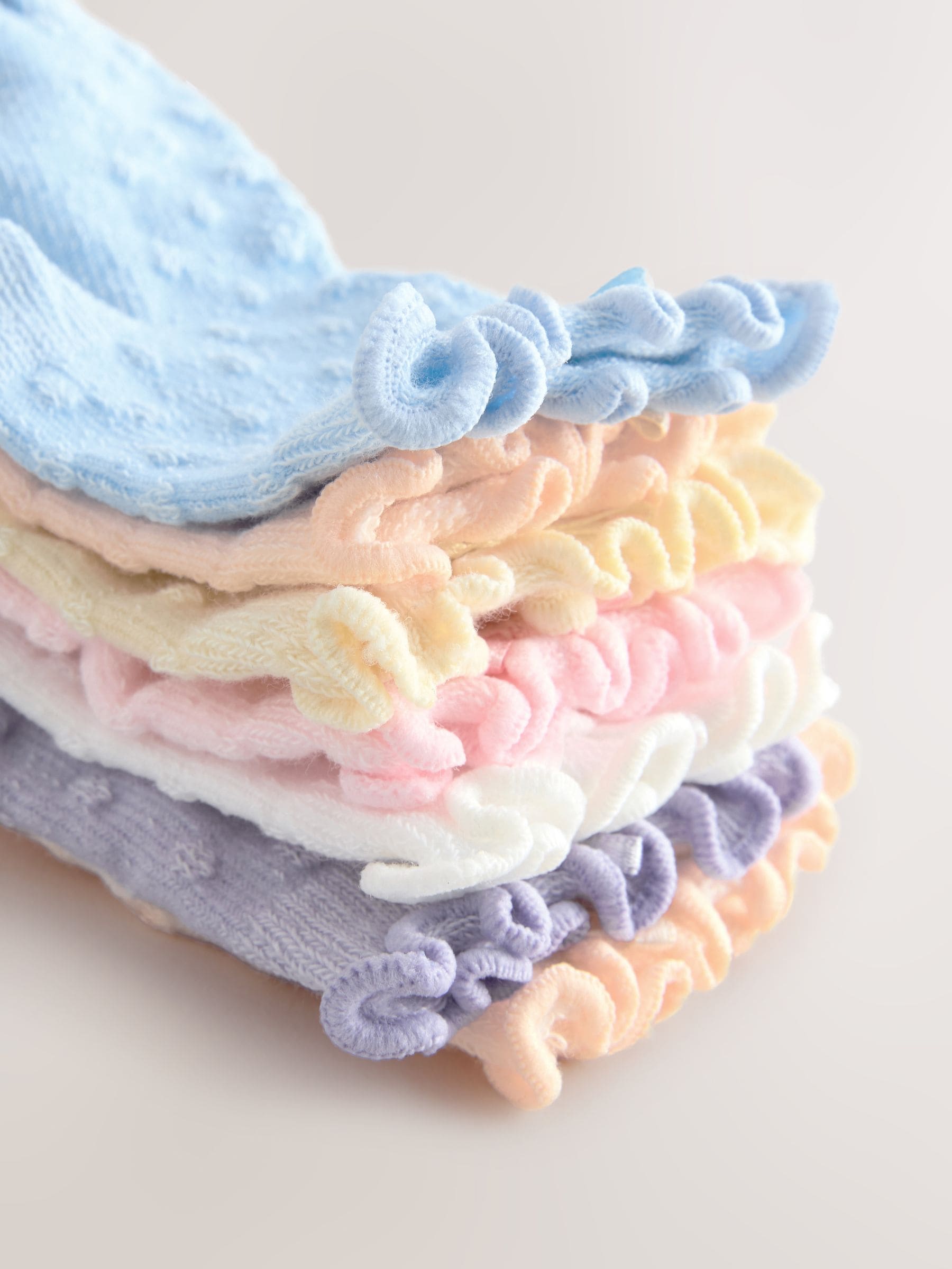 Multi - Verpakking van 7 babysokken met pastelkleurige ruches (0 mnd - 2 jr)