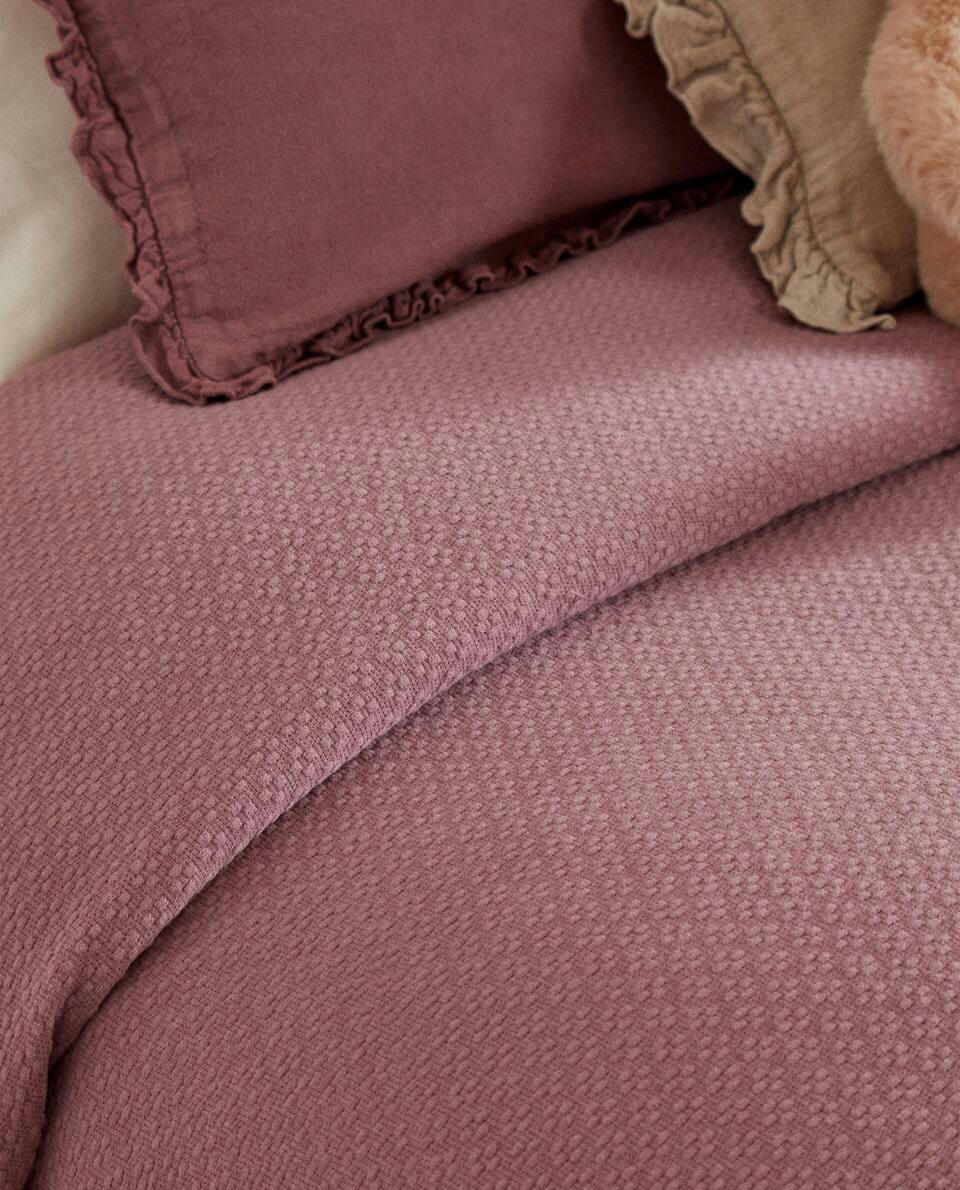 Colcha infantil de crochê jacquard