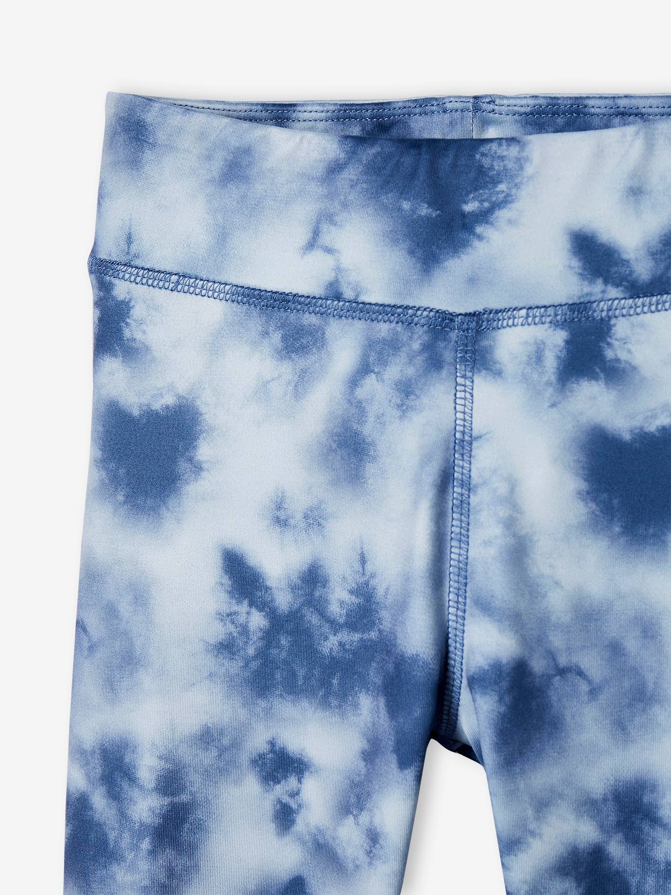 Leggings esportivas infantis azuis em tecido técnico com estampa.