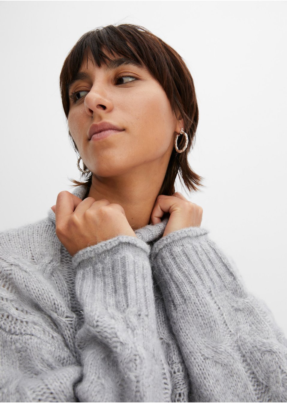 Pull en maille à torsades