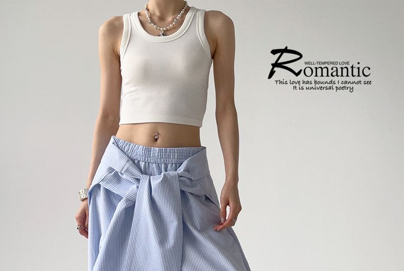 Rosesand - Gestreepte, losse, wijde broek met lage taille