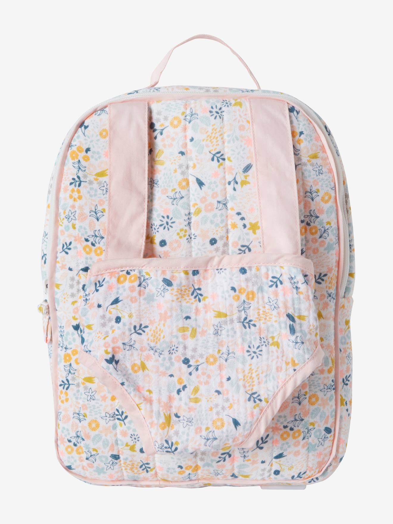 Mochila rosa para transportar bonecas