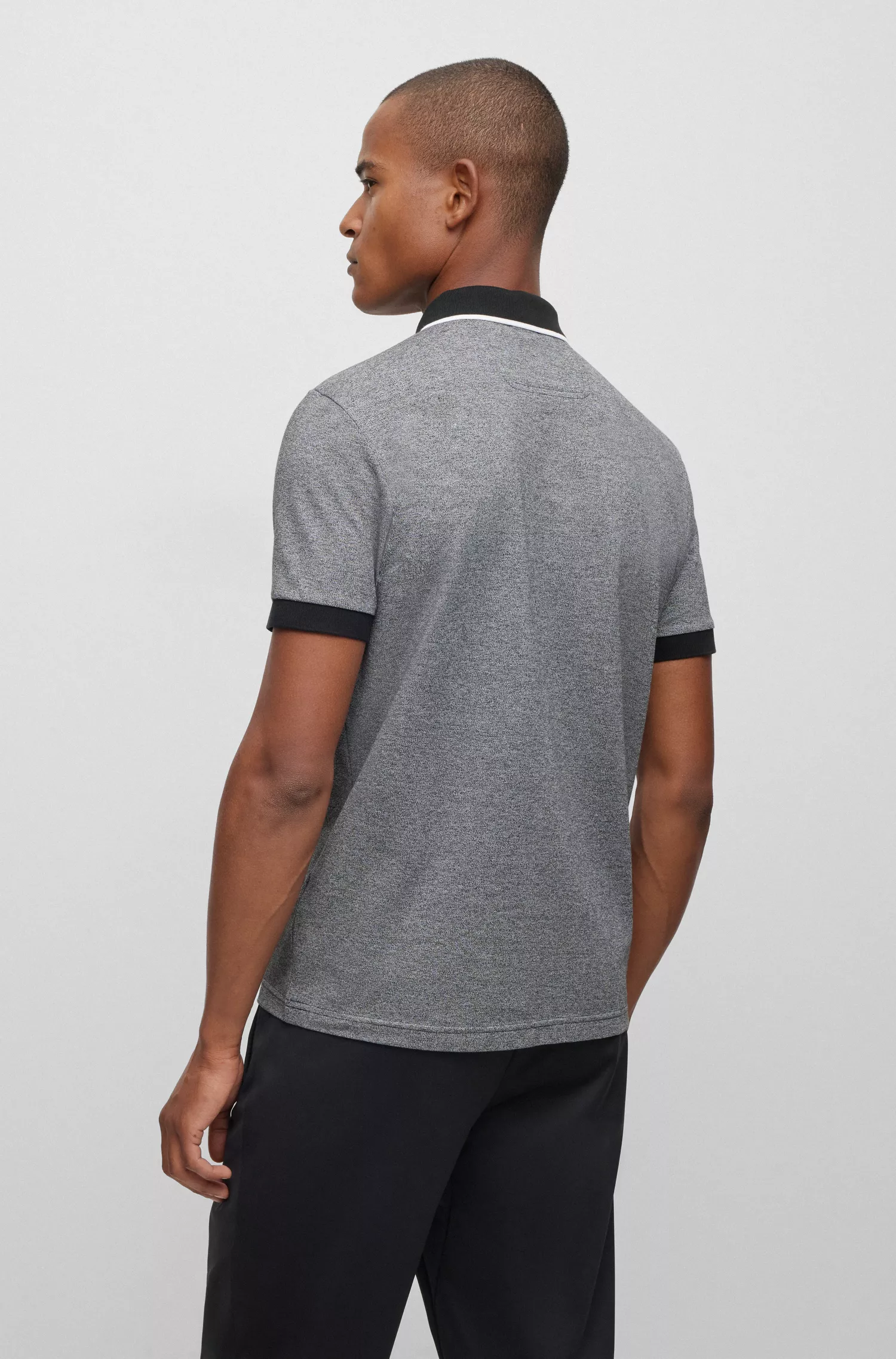 Camisa polo BOSS verde em piqué de algodão com logotipo bordado.