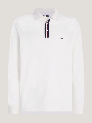 Polo de manga comprida com estampa listrada global e modelagem regular.