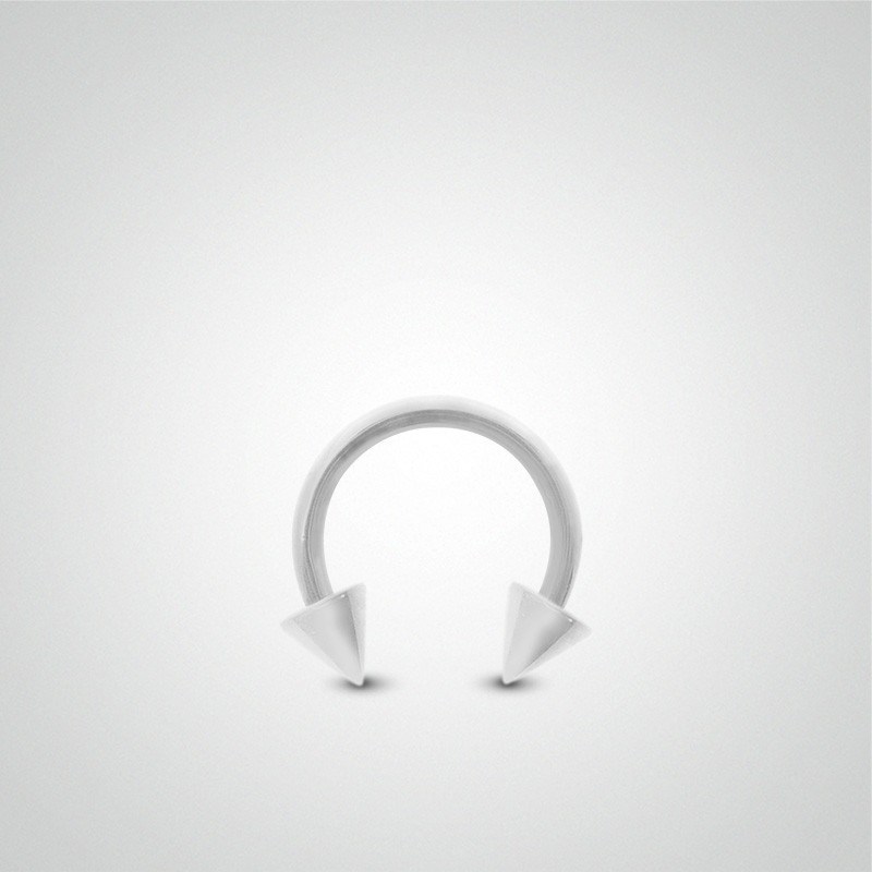 Piercing helix en or blanc : fer à cheval avec pics