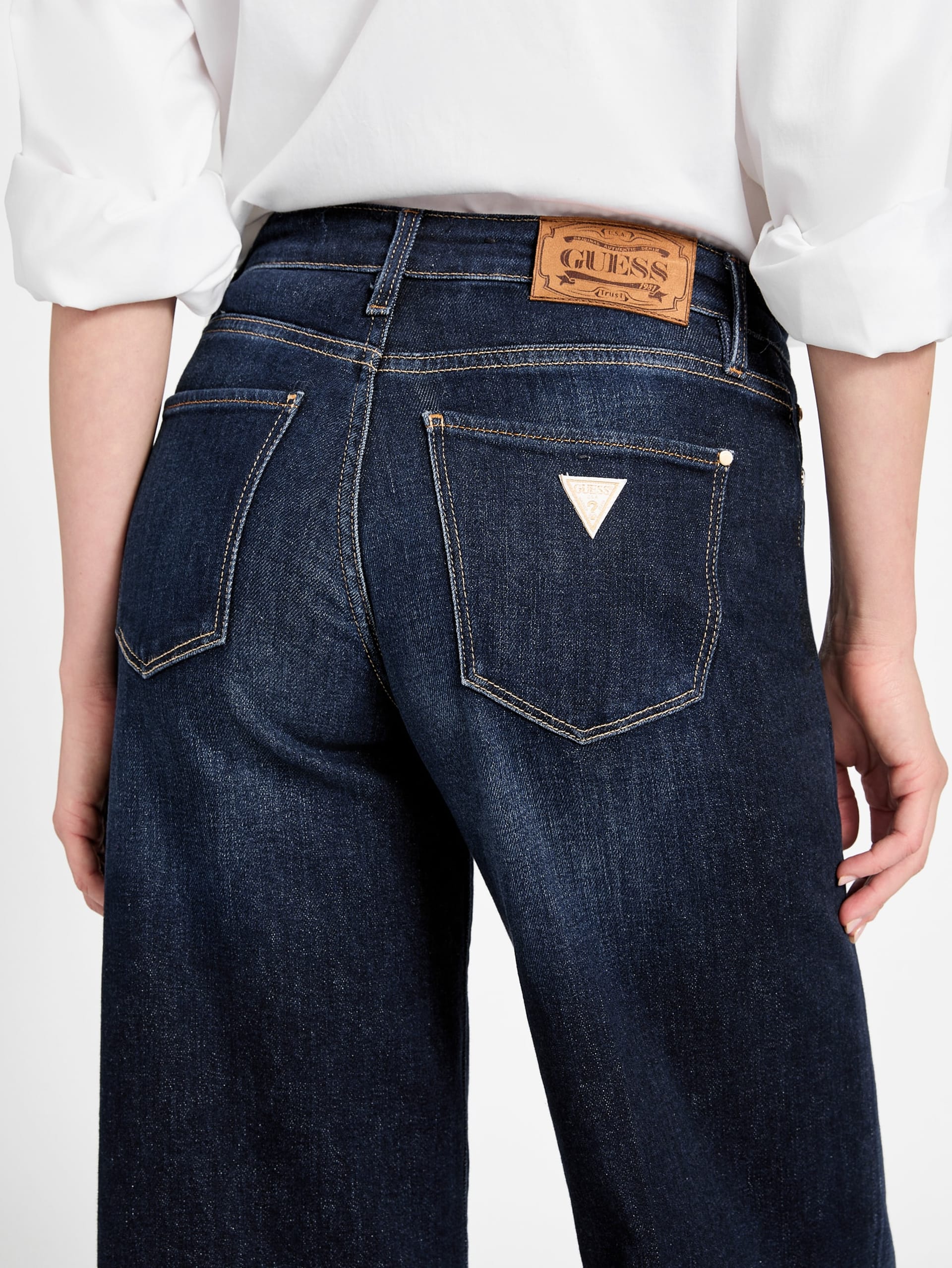 Calça jeans palazzo sexy de cintura média e pernas largas