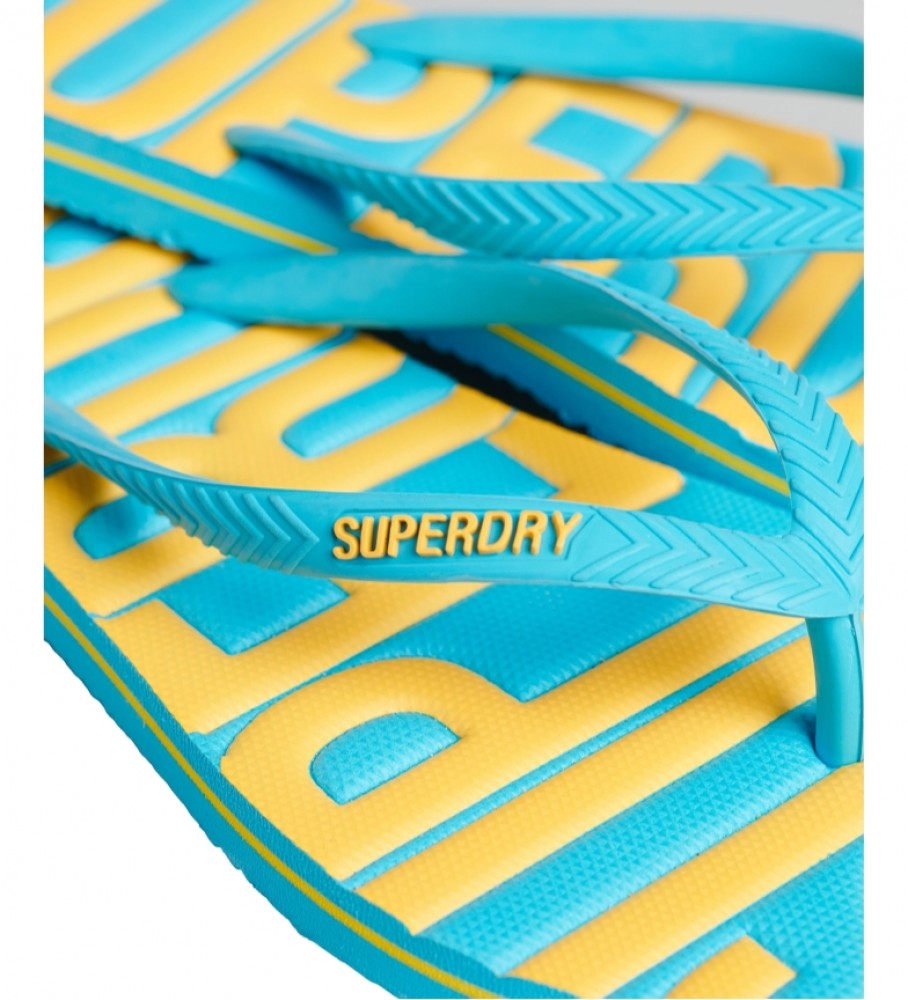 Chinelo vegano Superdry com logo vintage, azul.
