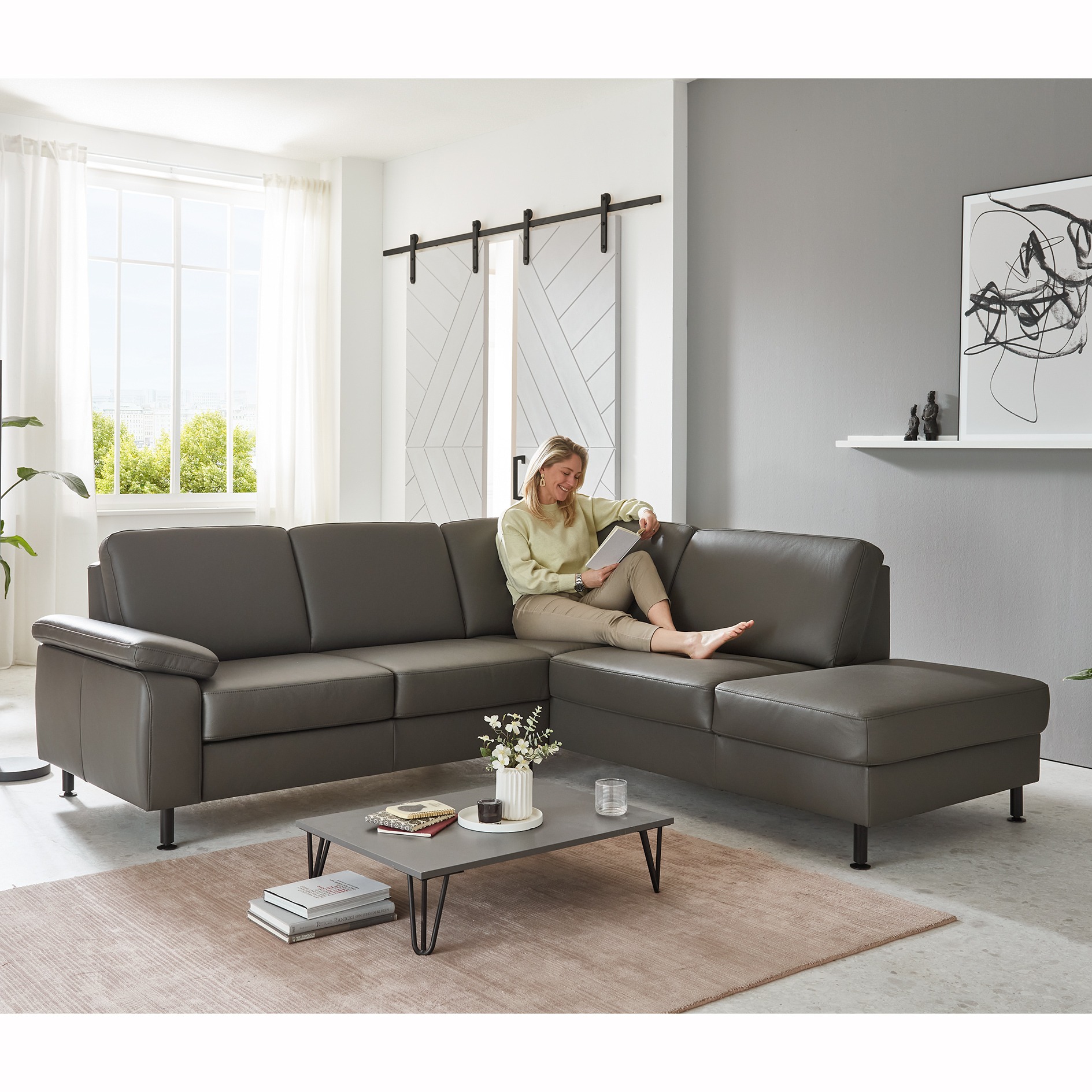 polsterpower Ledersofa - grau - Basismodell - Anstellhocker rechts