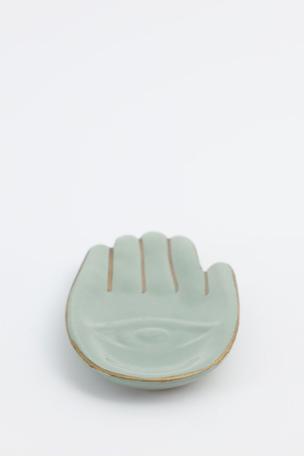Groene gebaksbordjes hand