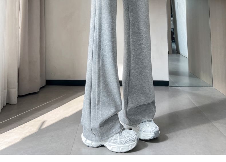 Tel tot 10 - Effen wijd uitlopende broek met trekkoord in de taille (verschillende ontwerpen)