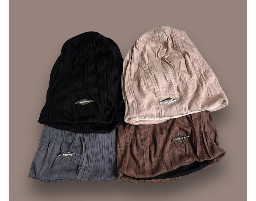 TAAK - Slouchy muts met appliqué