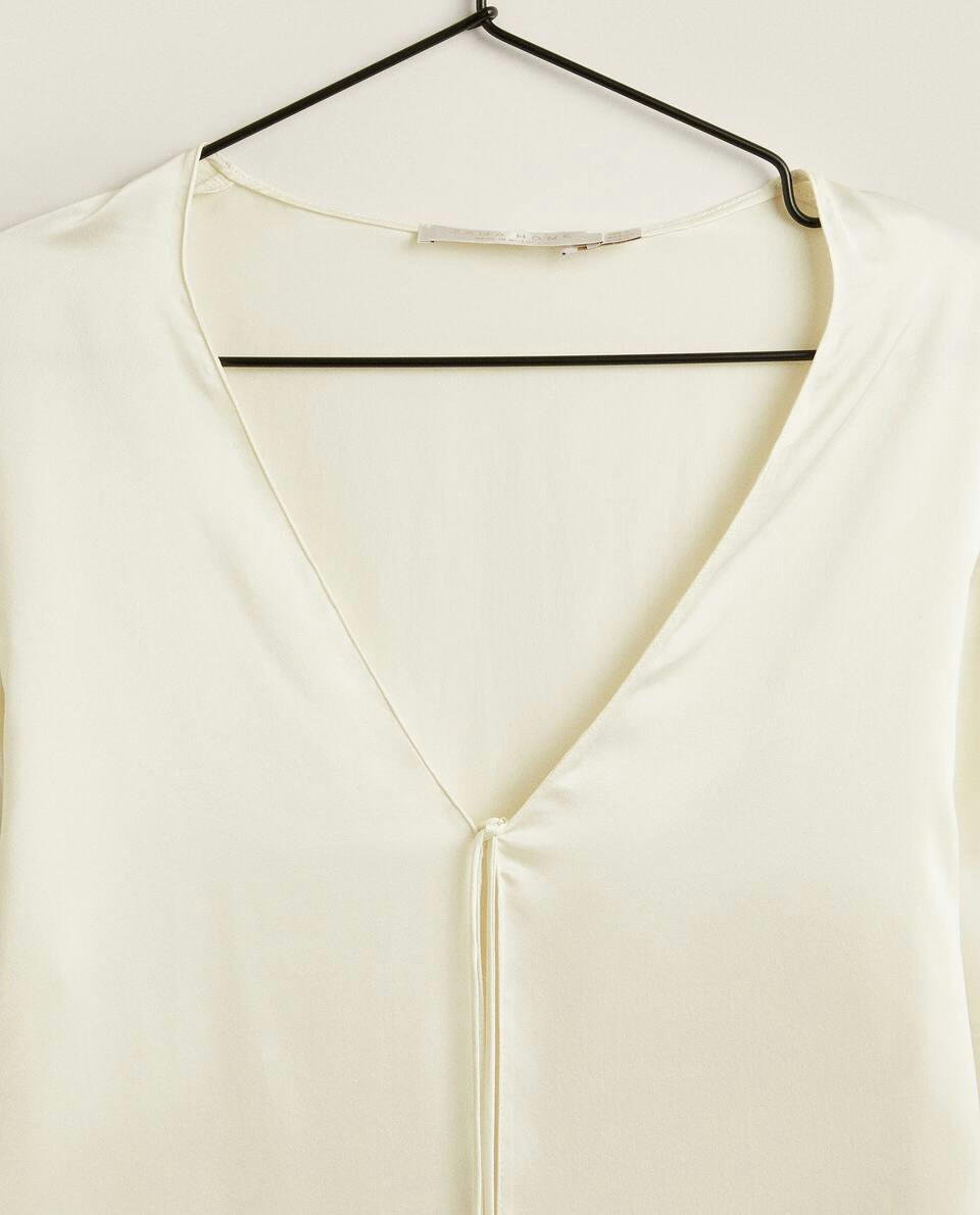 Blusa de seda crua
