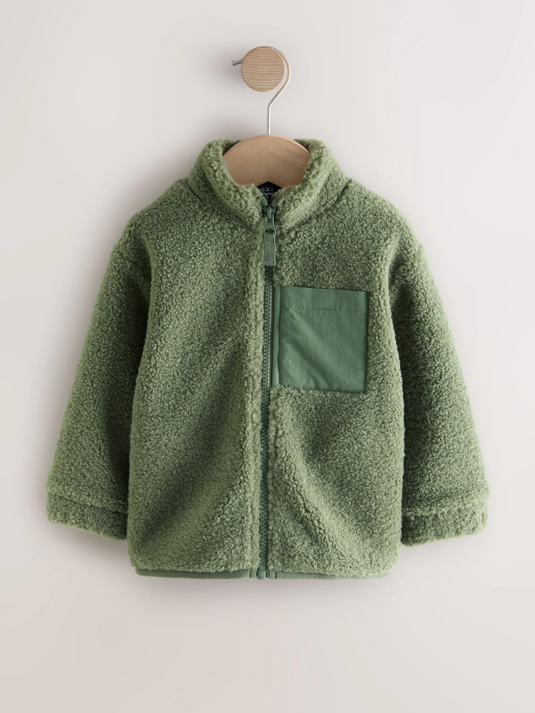 Mineraalkleurig - Effen fleece met rits en trechterhals (3mnd-7jr)