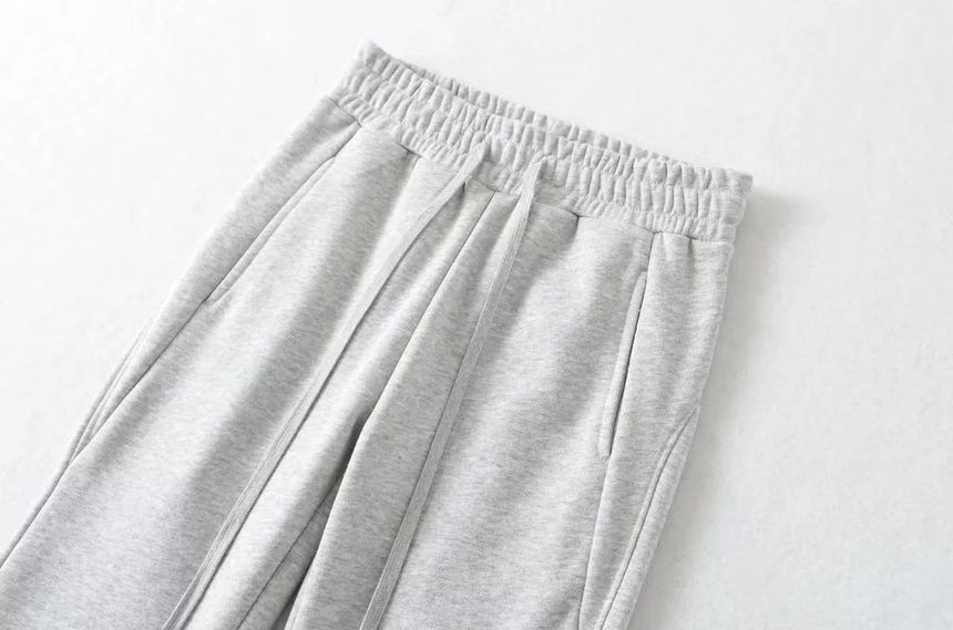 Florentine - Effen wijd uitlopende joggingbroek met trekkoord in de taille