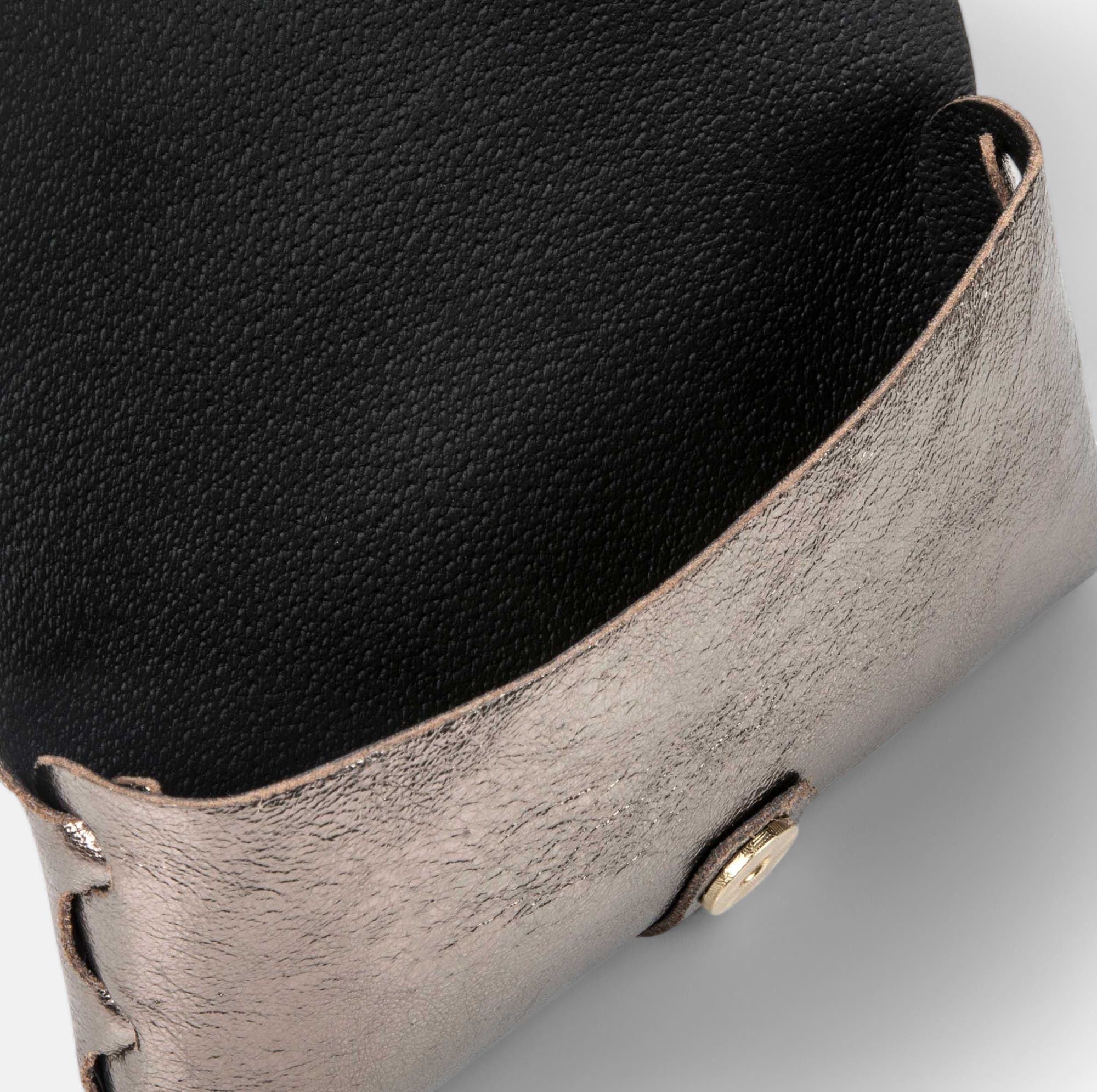 Petite maroquinerie en cuir bronze