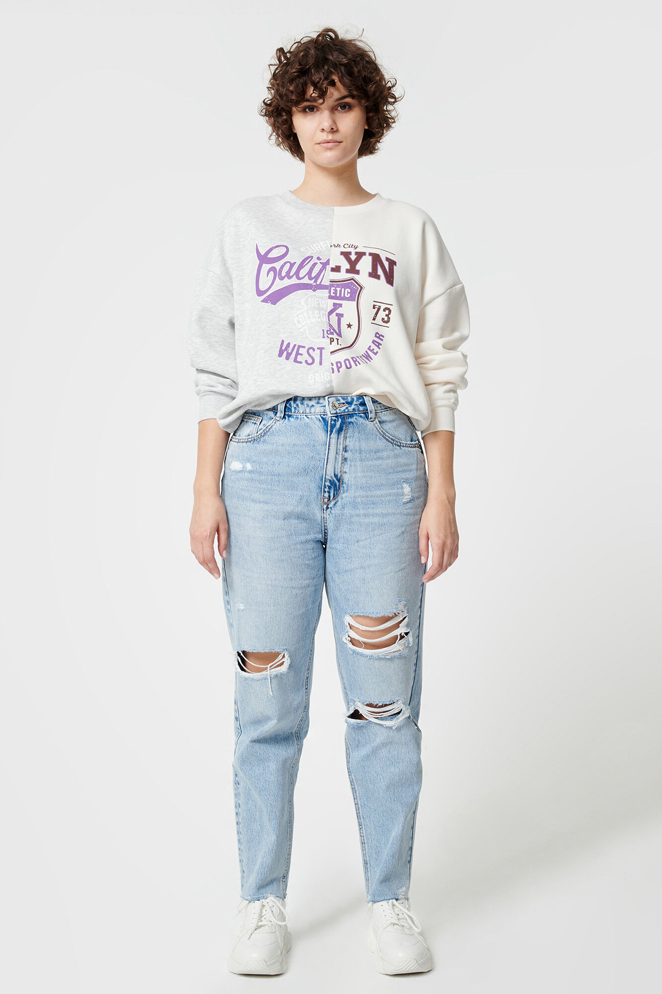 calças jeans mom desgastadas