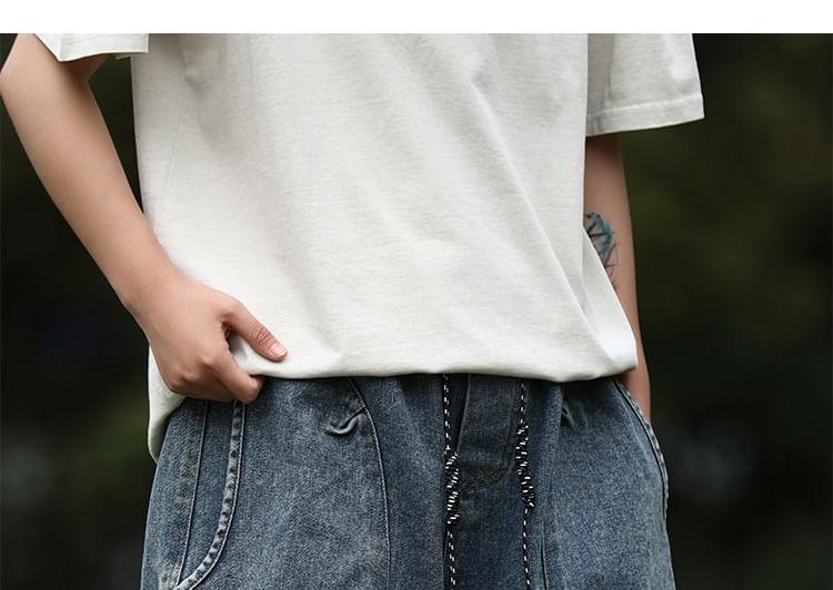 ROOSE - Mid-rise gewassen denim shorts