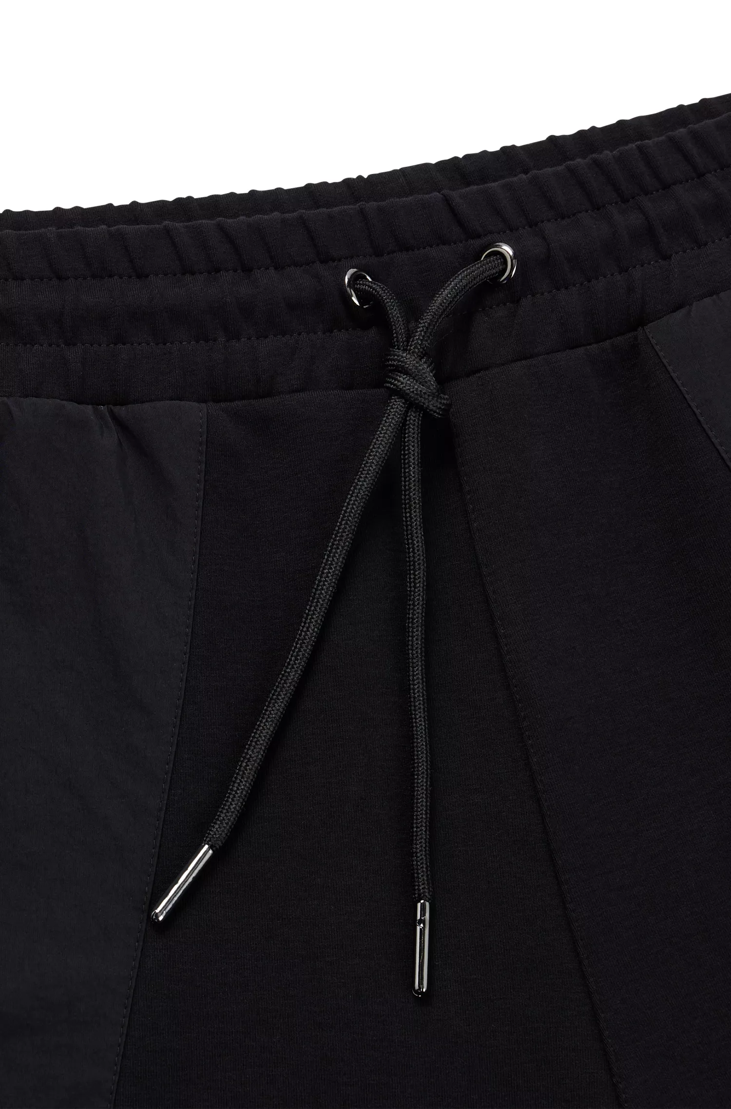 Calções HUGO vermelhos de corte relaxado em algodão elástico com bolsos contrastantes.
