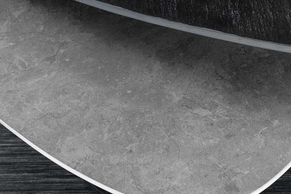 Design Couchtisch MOVEMENT schwarz grau rund drehbar Keramik Metallgestell