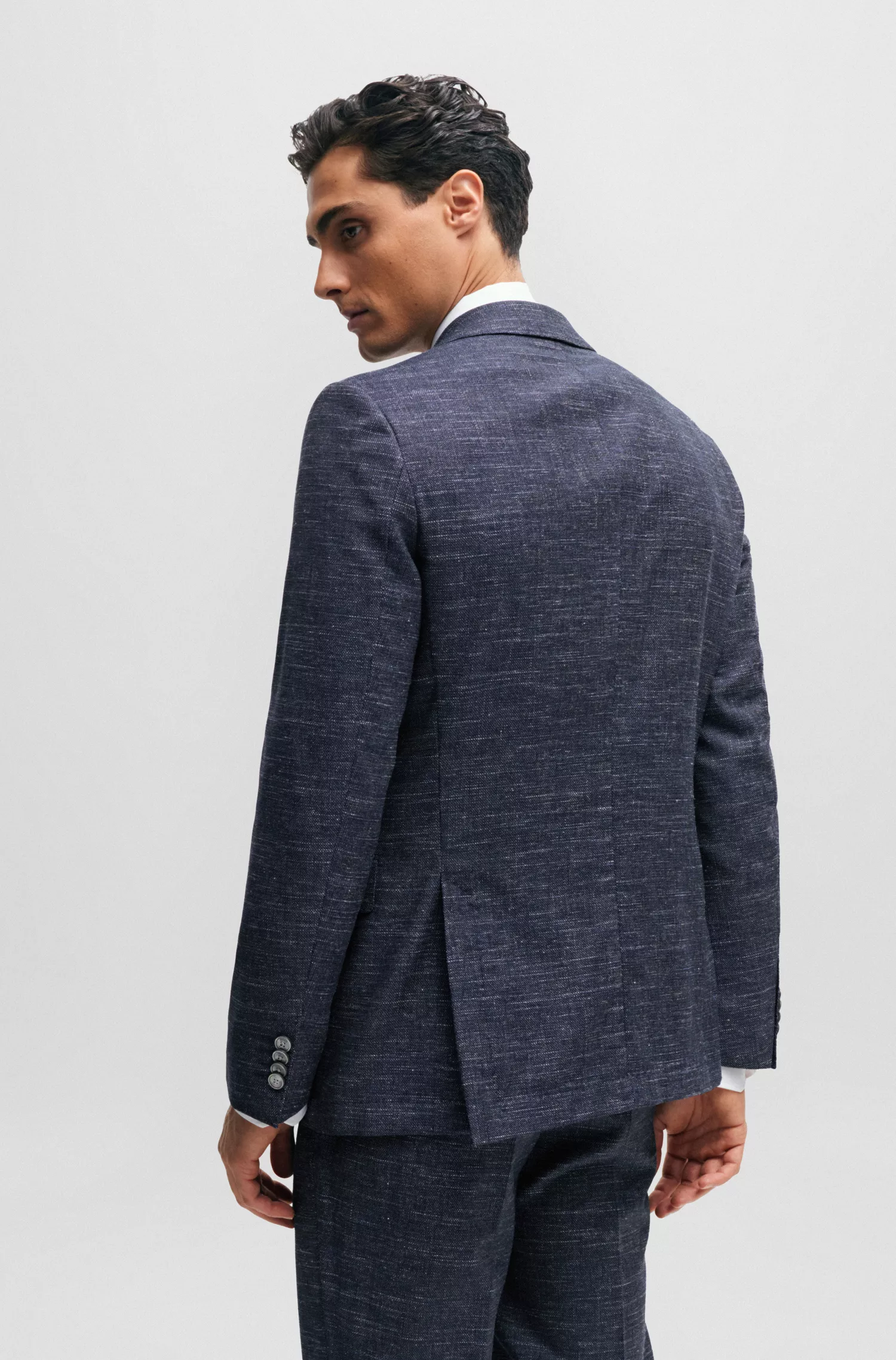 Jaqueta BOSS preta de corte slim em mistura de lã estampada.