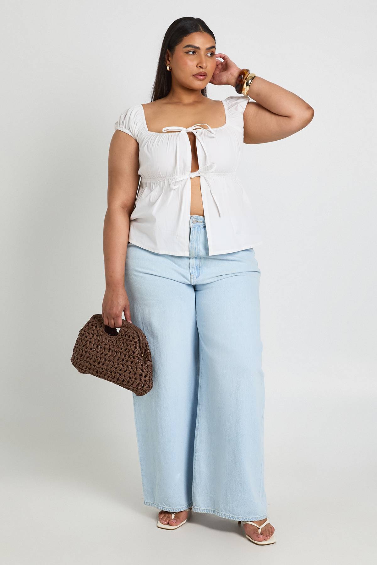 boohoo Haut Péplum À Détail De Nœud À Volants Étagés Grande Taille