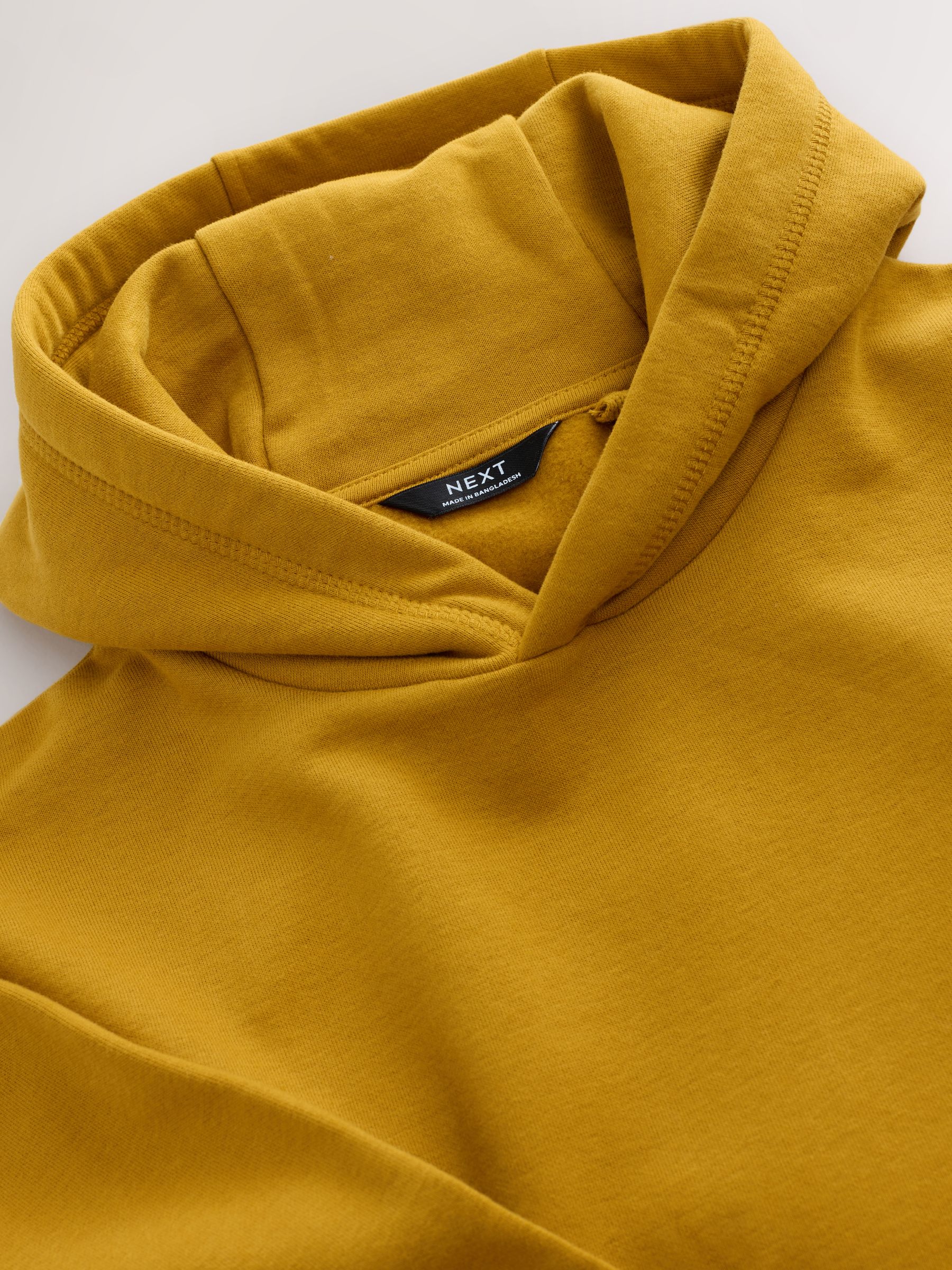 Geel - Effen jersey hoodie (3-16 jr)