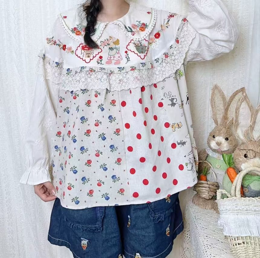 Aigan - Blouse met pofmouwen en kantversiering