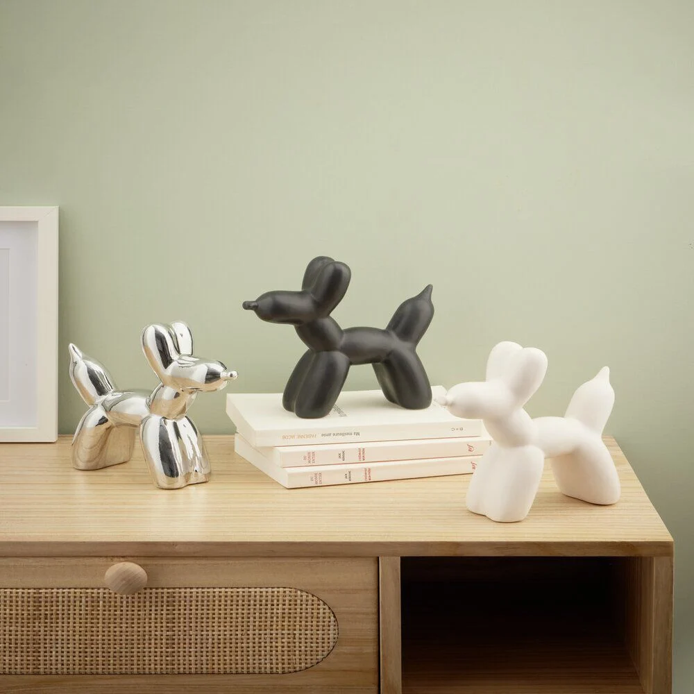 Chien céramique à poser forme ballon sculpté H16,5cm noir ou blanc  - 2 modèles