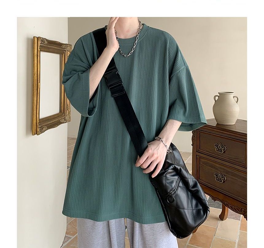 Nightbell - Effen oversized T-shirt met ronde hals en elleboogmouwen