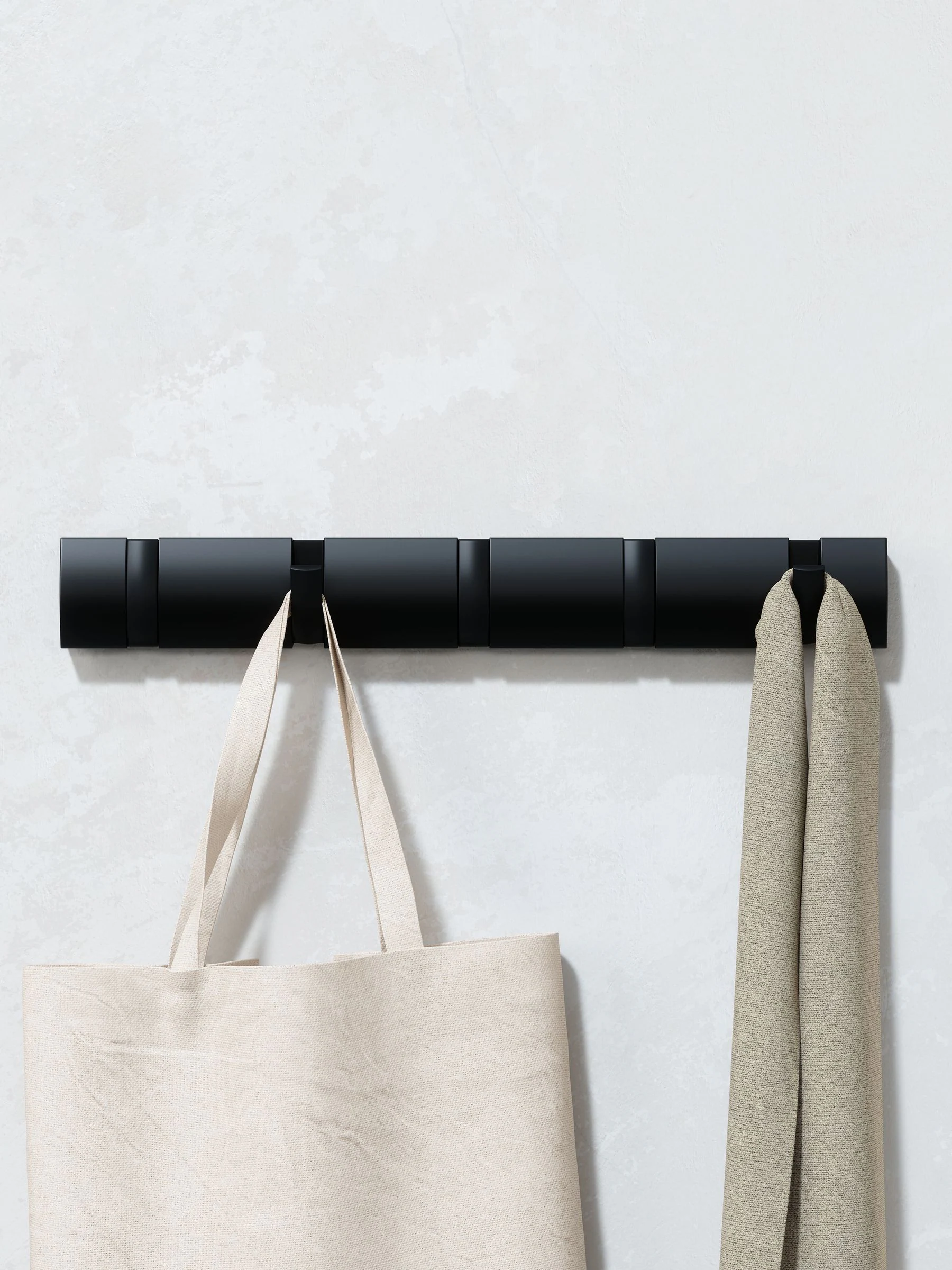 Umbra ruimtebesparende Flip kapstok voor aan de wand met inklapbare