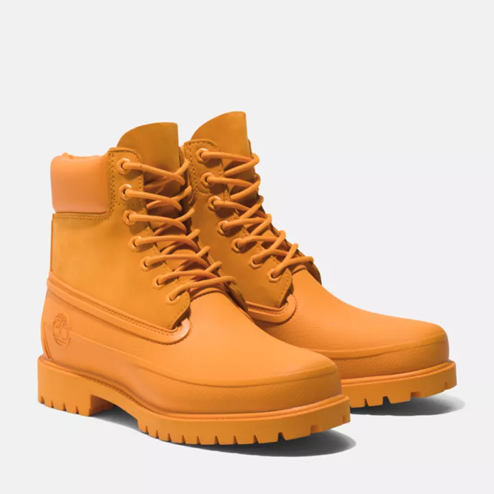 Bota Timberland Heritage de 6 polegadas com biqueira de borracha para homem, na cor laranja.