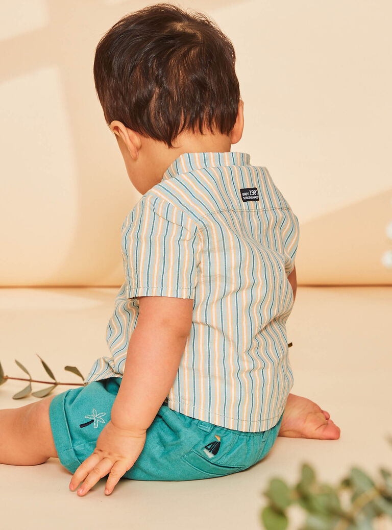 Chemise turquoise pâle à imprimé à rayures